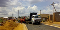 Typical view of road after receiving primer, ready for surfacing in Mohlakeng Township, West Rand